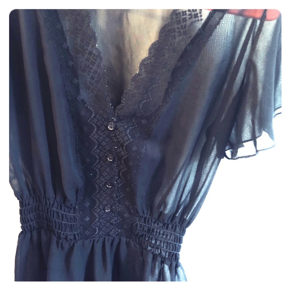 Cinched black blouse detailed with lace